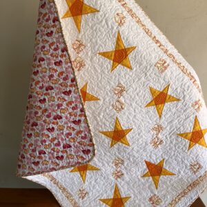 MANTA O QUILT PARA BEBÉ DE ESTRELLAS